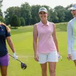 womens playing golf